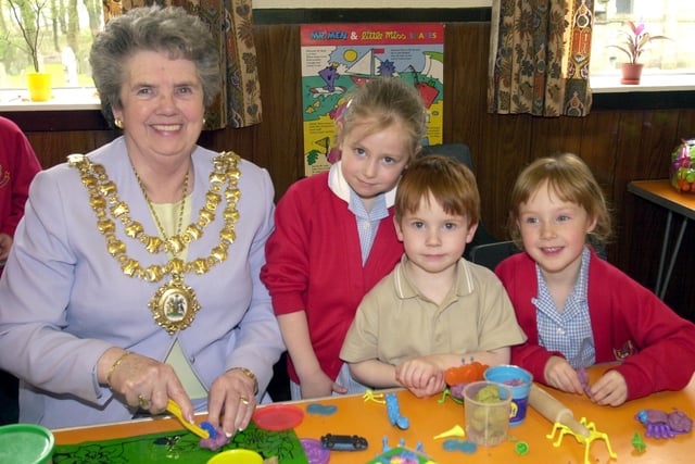 Wigan's then Mayor Joan Hurst officially opened the new after-school children's club at St David's Primary, Haigh. She is pictured with Rebecca Murphy and Ben and Alice Jarvis