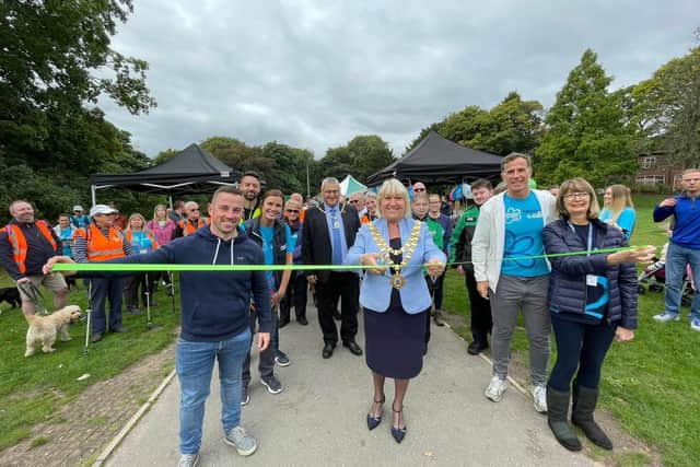 The then Mayor Coun Marie Morgan and Sky Sports rugby league presenter Phil Clarke get the 2022 Memory Walk underway at Haigh Woodland Park