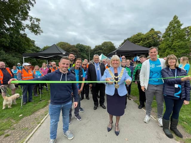 The then Mayor Coun Marie Morgan and Sky Sports rugby league presenter Phil Clarke get the 2022 Memory Walk underway at Haigh Woodland Park