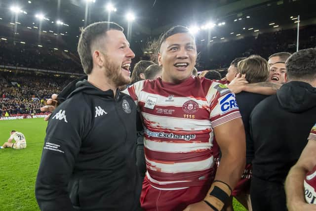 Wigan's Cade Cust & Patrick Mago celebrate the Grand Final victory at Old Trafford