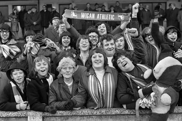 Wigan Athletic fans cheer on their team against Runcorn in a Northern Premier League match at Springfield Park on Saturday 30th of December 1972.
Latics won 3-0 with Micky Worswick, Graham Oates and John Rogers scoring the goals.
