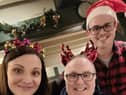 Derrick Cunliffe (centre) pictured with daughter Terri Morris and her husband Ben at a family Christmas