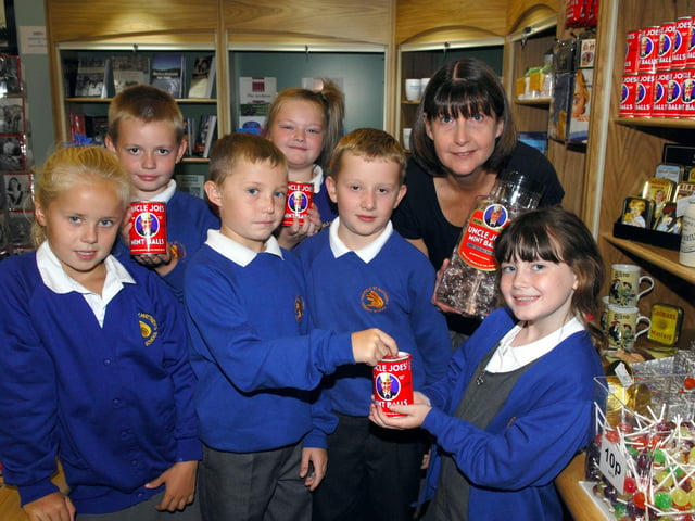Highfield St Matthew's CP School year four visit to the Wigan Life Museum.
Sue Maiden, learing officer, is pictured with some of the pupils as they look at Uncle Joes sweets which are made in Wigan.
