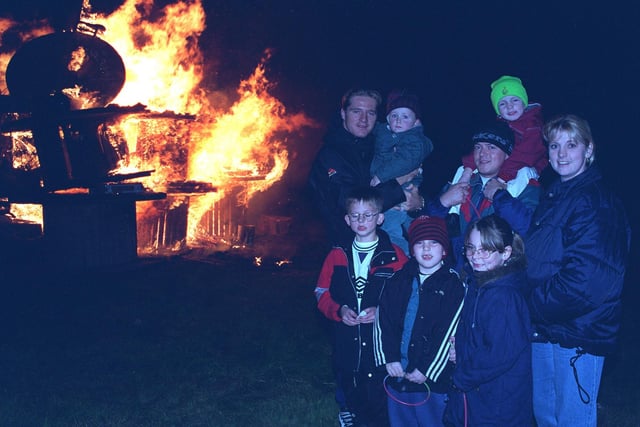Simon Haughton joins in the fun after lighting the bonfire at Cheetam House Farm in Abram.