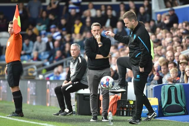 Leam Richardson looks thoughtful in the technical area