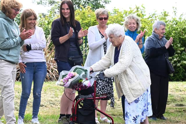 Cath Brookfield cheered on during her Captain Tom-like charity walks for Ashton Deaf Club.