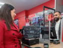 Wigan MP Lisa Nandy at the new post office with postmaster Arif Matadar