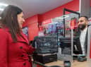 Wigan MP Lisa Nandy at the new post office with postmaster Arif Matadar