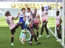 Callum Lang gets stuck in against Reading