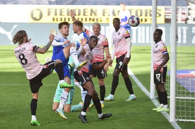 Callum Lang gets stuck in against Reading