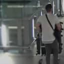 Craig Bramall, 42, from Abram, was caught on CCTV footage at the airport with suitcases of cash