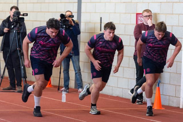 Wigan Warriors players go through a YoYo session at their media day