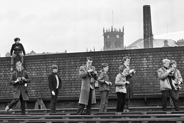 Enthusiasts gather to watch the last train, Tudor Minstrel, on its way to do the Waverley run from Carlisle to Edinburgh, pass through Wigan North Western Station in April 1966.
