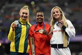 Georgia Bell (far right) shows off her 1,500m bronze medal