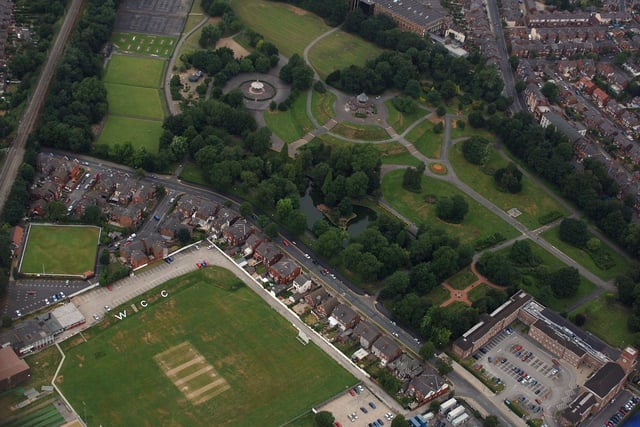 WIGAN AERIAL PICTURES - Above Parson's Walk, running into Park Road, bordered by Wigan Cricket Club, Wigan Subscription Bowling Club, Mesnes Park and The Thomas Linacre Centre at the old Mesnes High School.