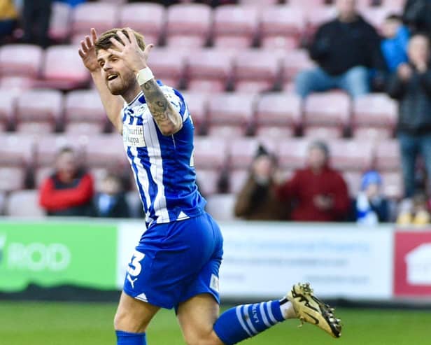 Charlie Kelman's first goal for Latics wasn't enough to prevent Exeter winning at the DW