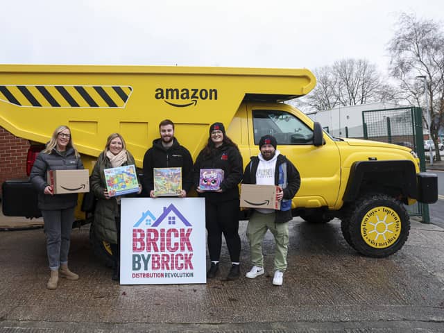 Hundreds of Amazon’s Top Ten Toys for Christmas were delivered to The Brick in Wigan via a giant toy truck