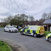 Police at the scene of the dead baby's discovery in Marsh Green
