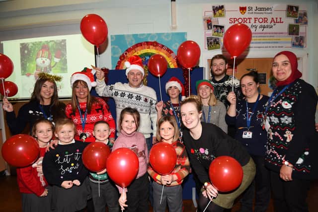 WIGAN - 14-12-22 Staff and pupils celebrate gaining a good OFSTED report, with a Christmas party and Christmas dinner.