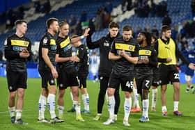 The Latics players thank the travelling fans after the 1-0 defeat at Huddersfield in midweek