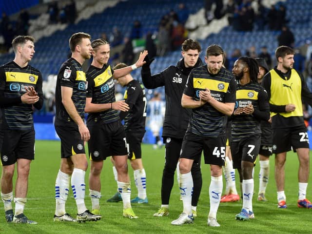 The Latics players thank the travelling fans after the 1-0 defeat at Huddersfield in midweek