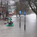 Flooding turned the street into a river on New Year's Day. Picture by David Hurst.