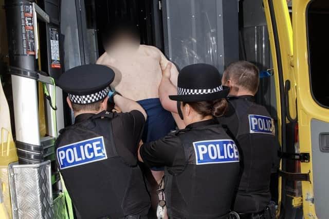 Three people were arrested in the early morning raids