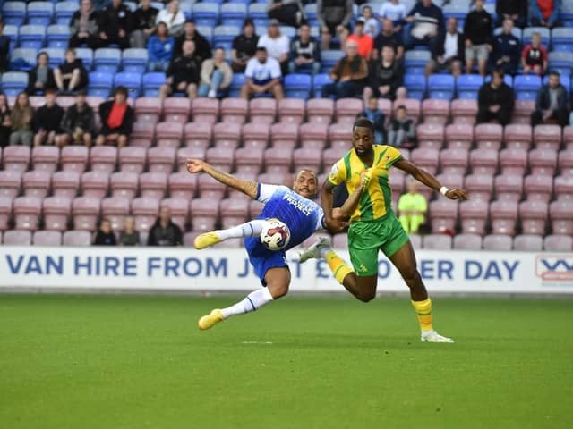 Josh Magennis opens the scoring against West Brom
