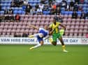 Josh Magennis opens the scoring against West Brom