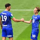 Kieran Dowell (right) celebrates with Kieffer Moore after scoring one of his hat-trick against Hull in 2020