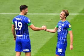 Kieran Dowell (right) celebrates with Kieffer Moore after scoring one of his hat-trick against Hull in 2020
