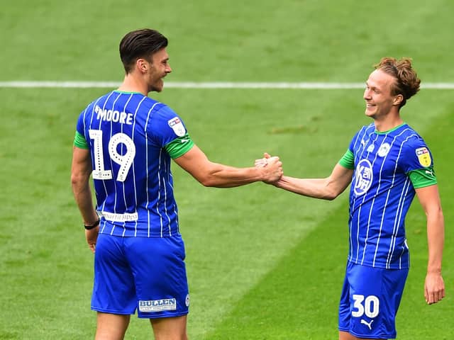 Kieran Dowell (right) celebrates with Kieffer Moore after scoring one of his hat-trick against Hull in 2020