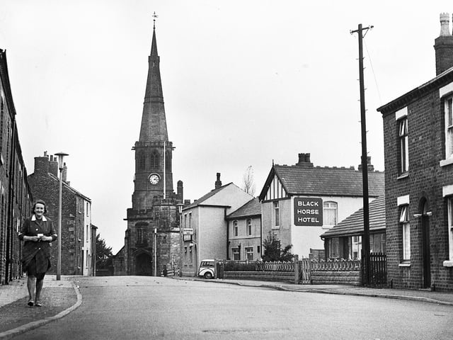 Church Street, Standish, in November 1971, showing St. Wilfrid's church in the background and the Black Horse Hotel which is now the Lychgate Tavern.