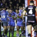 Wigan's Kruise Leeming celebrates Patrick Mago's try against Castleford