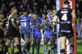 Wigan's Kruise Leeming celebrates Patrick Mago's try against Castleford
