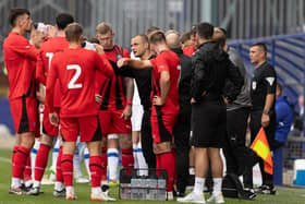 Shaun Maloney gets the message across to his Latics players at Tranmere