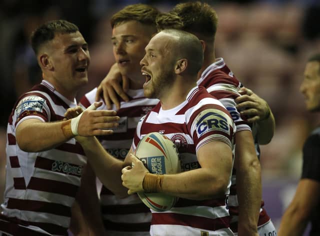 Liam Marshall went over for a hat-trick against Warrington Wolves