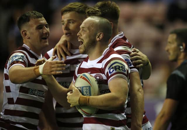 Liam Marshall went over for a hat-trick against Warrington Wolves