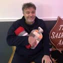 Captain Darron Boulton, church leader of The Salvation Army in Atherton, with a warm care package for a homeless person