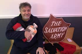 Captain Darron Boulton, church leader of The Salvation Army in Atherton, with a warm care package for a homeless person