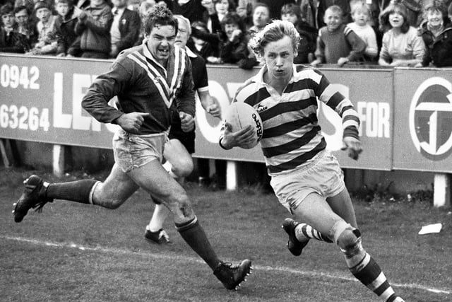 Wigan centre Dennis Ramsdale strides over for a try against St. Helens in a league match at Central Park on Sunday 25th of April 1982.
Wigan won 23-5.