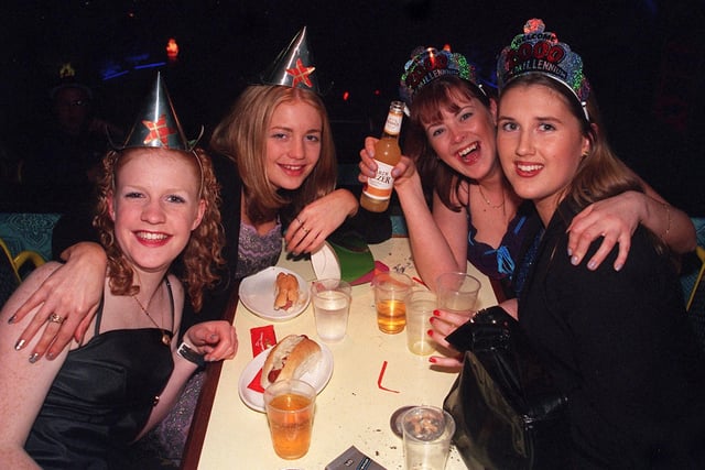 New Year revellers at Princes Nightclub ready for the big countdown for the Millennium, pictured from left; Louise Brown, 18 from Highfield, Julia Brown, 22 from Highfield, Cheryl Pilling, 20 from Standish Lower Ground and Helen Gregory 23 from Orrell. - Millennium new year celebrations