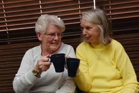 Members of the community enjoy a brew, biscuit, watch tv and chat at the first Warm and Cosy event, held every Wednesday 1pm to 3.30pm at St Judes Social Club, Poolstock, Wigan.