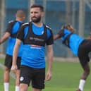 Graeme Shinnie has rejoined Aberdeen on a permanent deal