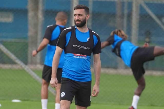 Graeme Shinnie has rejoined Aberdeen on a permanent deal
