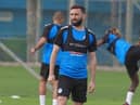Graeme Shinnie has rejoined Aberdeen on a permanent deal