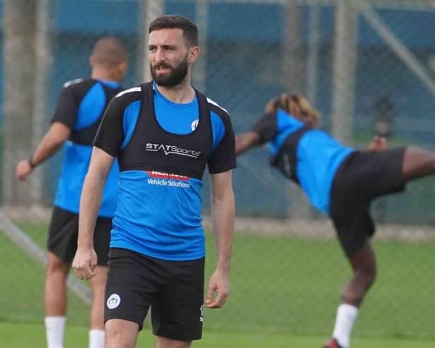 Graeme Shinnie has rejoined Aberdeen on a permanent deal