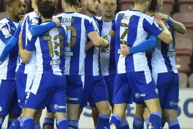 The Latics players celebrate against Fleetwood in midweek