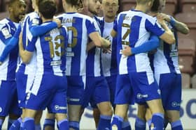 The Latics players celebrate against Fleetwood in midweek