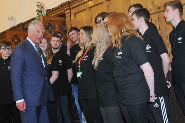 Prince Charles meets young people from the Prince's Trust team, at The Old Courts, Wigan. - HRH Prince Charles visits Wigan Little Theatre as well as Uncle Joe's Mint Ball factory and The Old Courts, Wigan, April 2019.